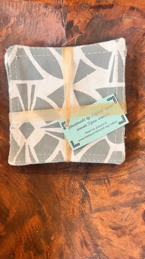 Rise beyond the reef Stenciled cloth coaster
